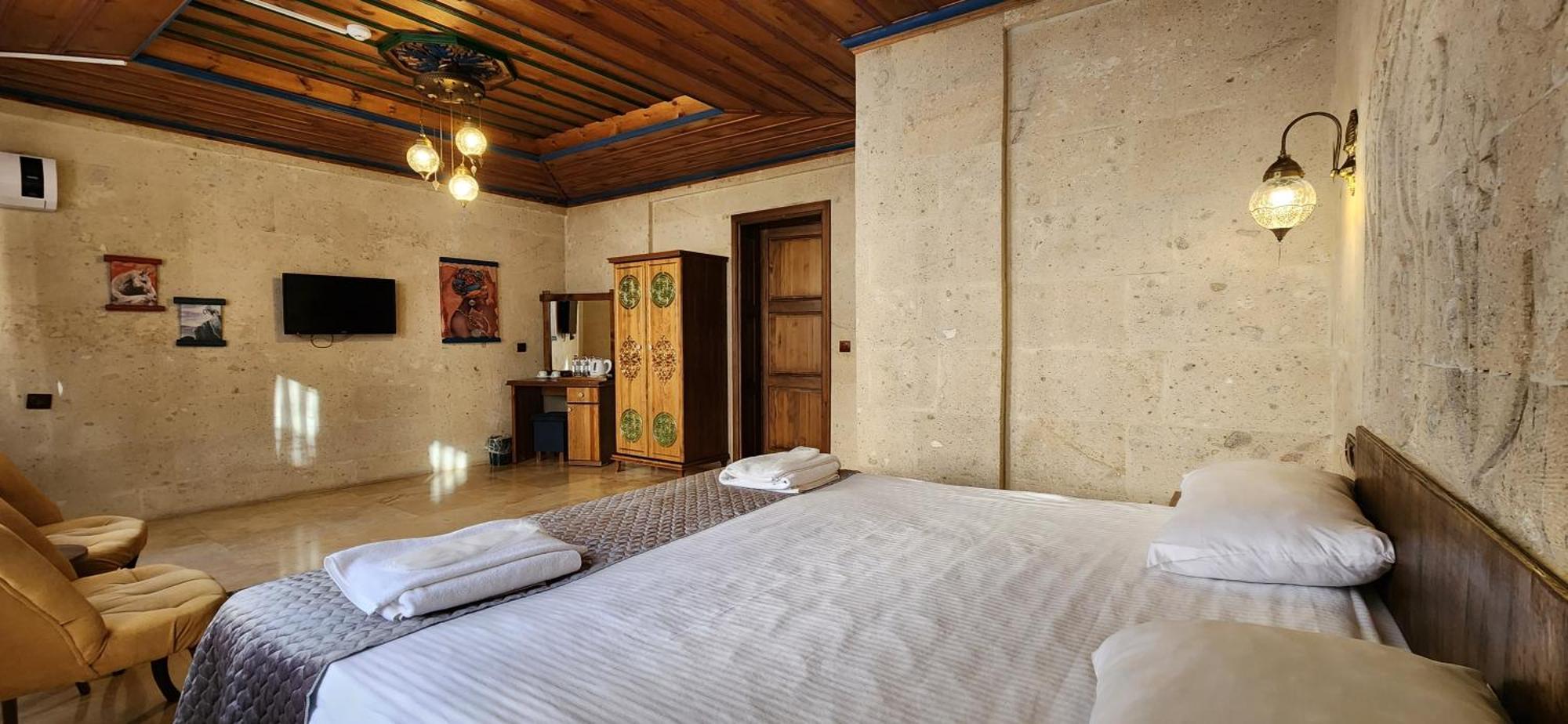 Bed and Breakfast Cappadocia Elite Stone House Гореме Номер фото